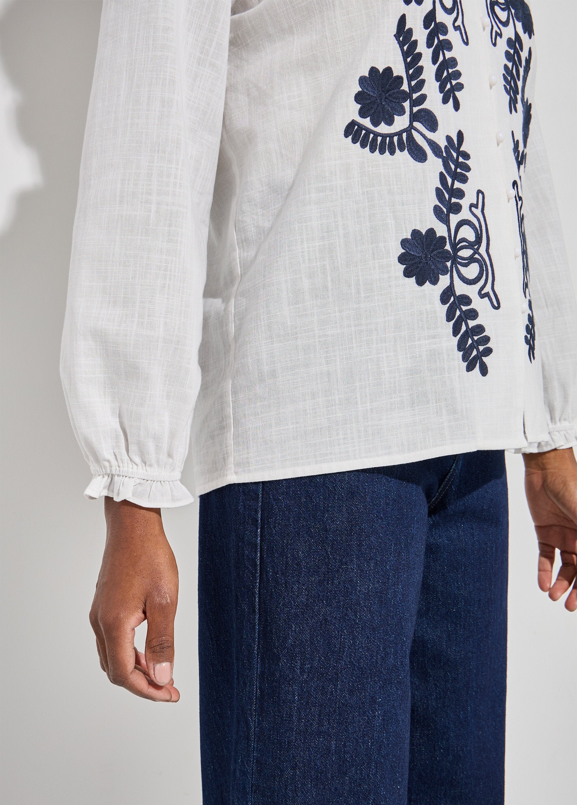 Embroidered_button-front_blouse_with_a_ruffled_collar_White_and_navy_DE2_slim