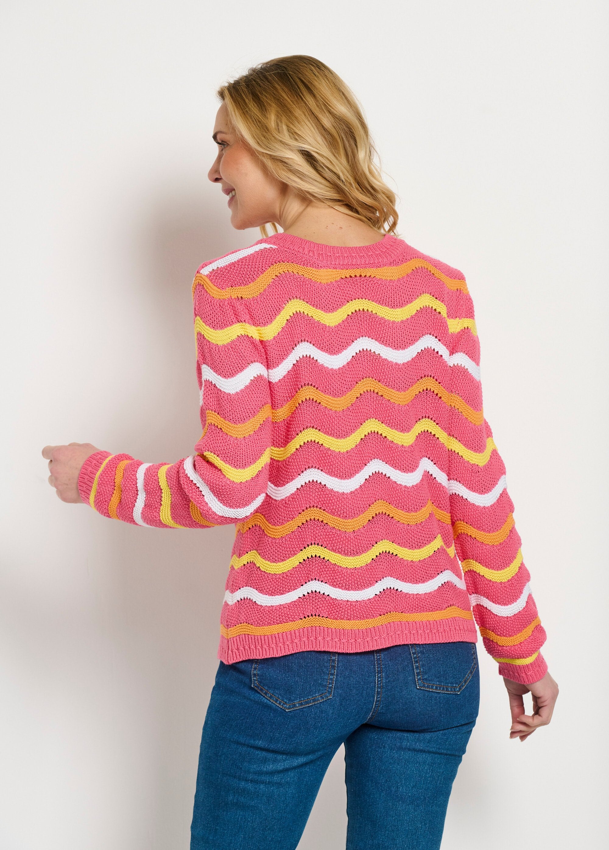 Soft_round_neck_sweater_with_raised_stripes_and_garter_stitch_Pink_background_DO1_slim